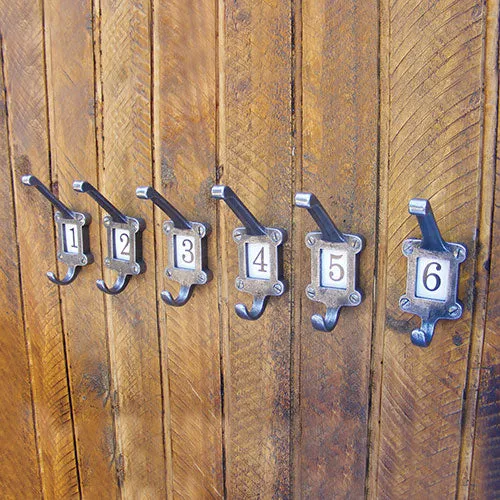 Numbered cloakroom hook in cast iron